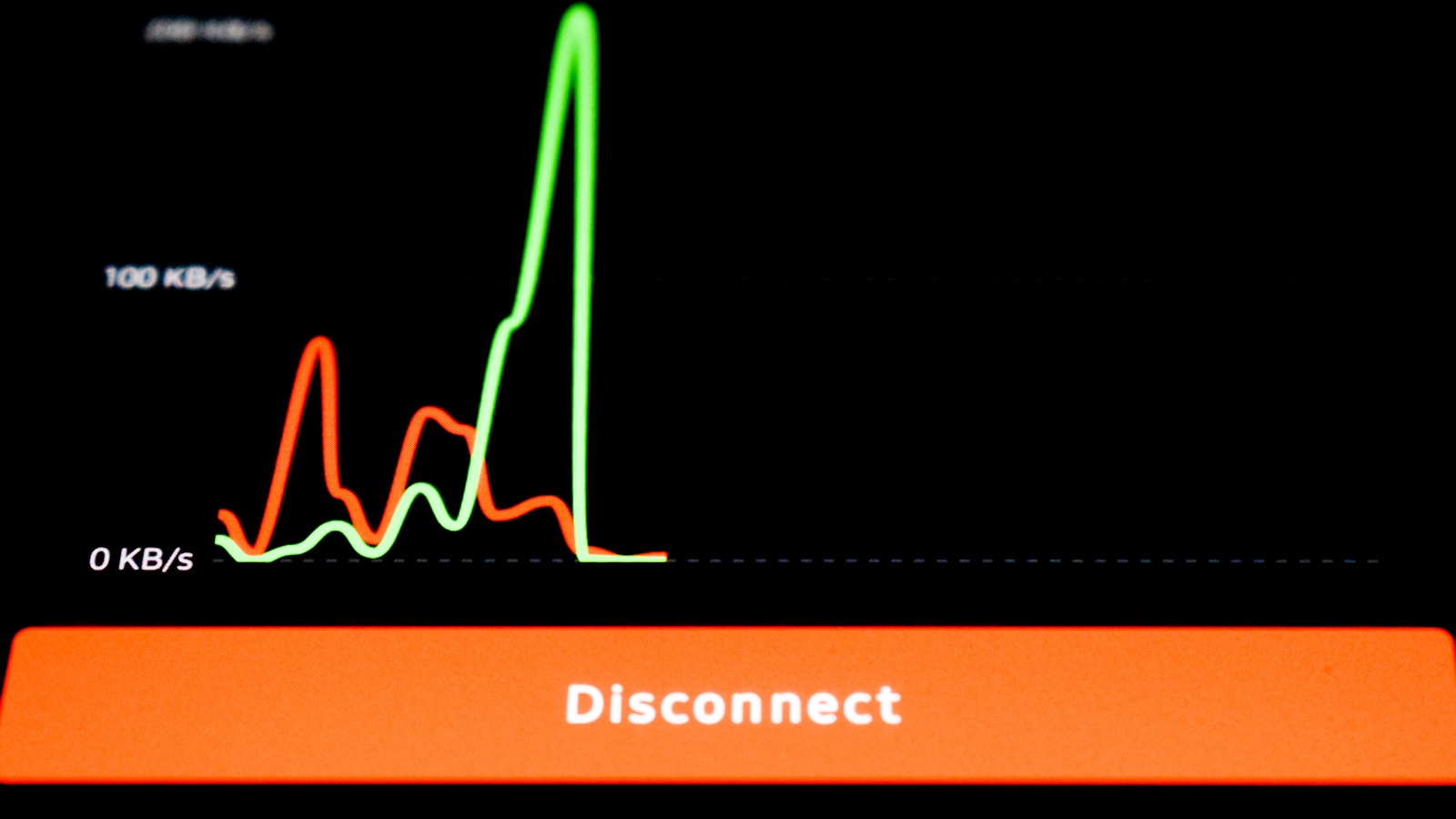 Smartphone screen showing red and green network performance graph lines